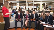 Students In Class Group Reading
